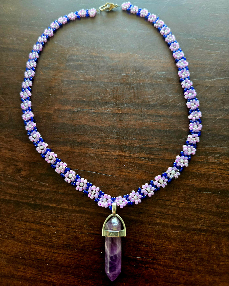 Purple and white daisy chain with matching crystal pendant