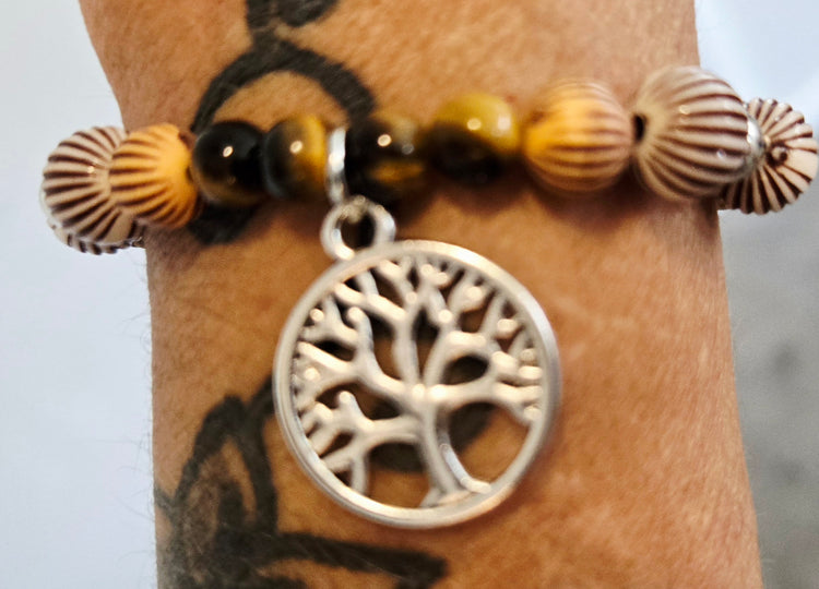 Tiger's eye and painted wooden bead bracelet featuring a life tree pendant