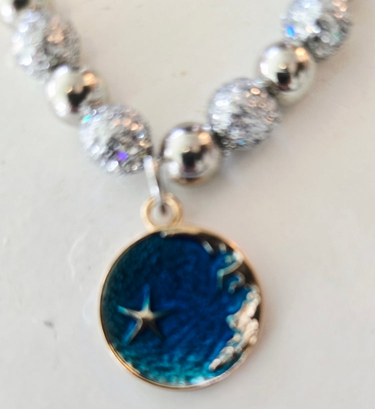 Hematite and silver beaded necklace with moon pendant