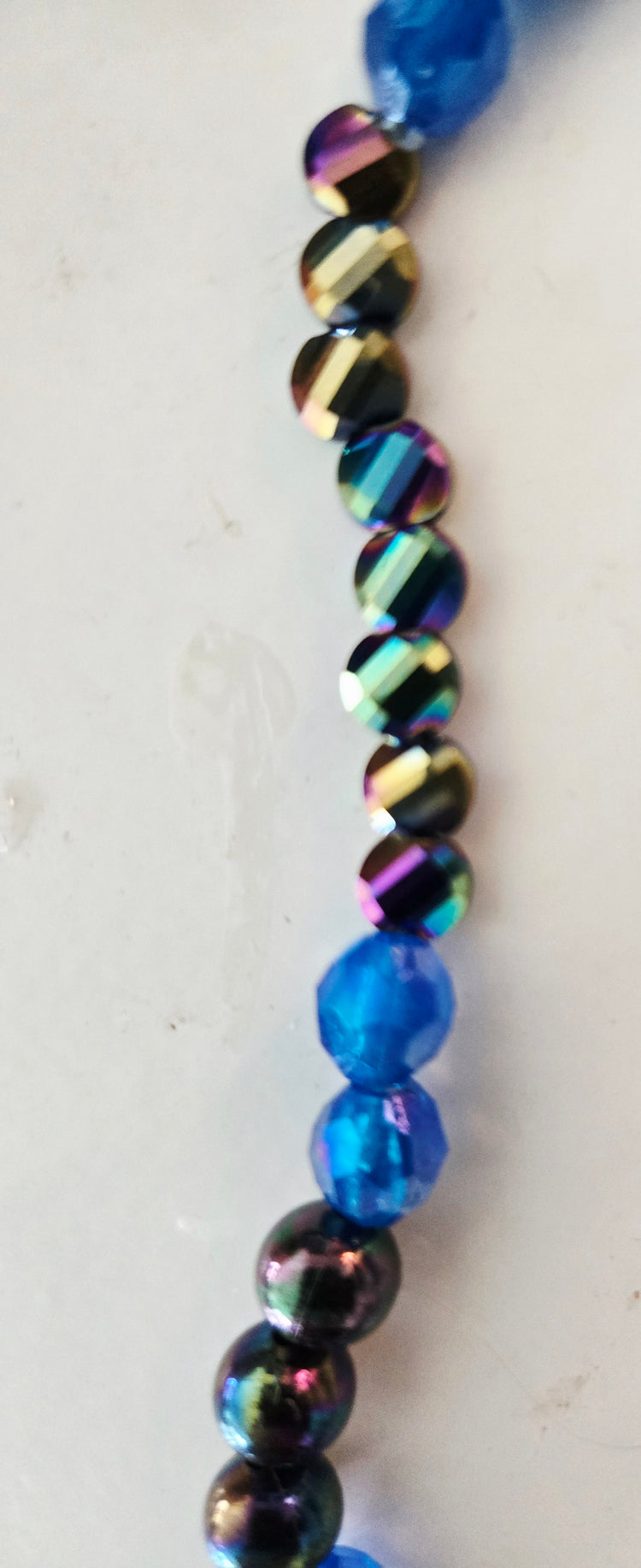 Hematite and silver beaded necklace with moon pendant