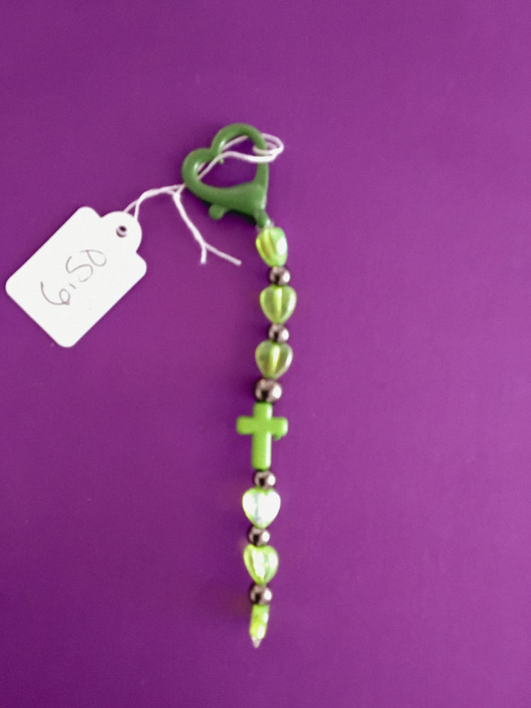 Green and white cross keychain