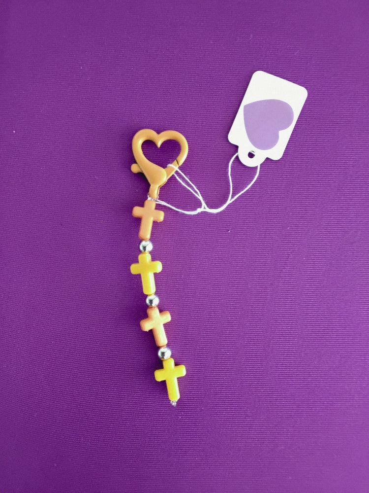 Orange and silver cross keychain