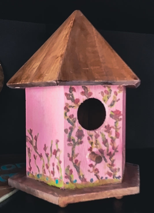 Pink flower vine bird house