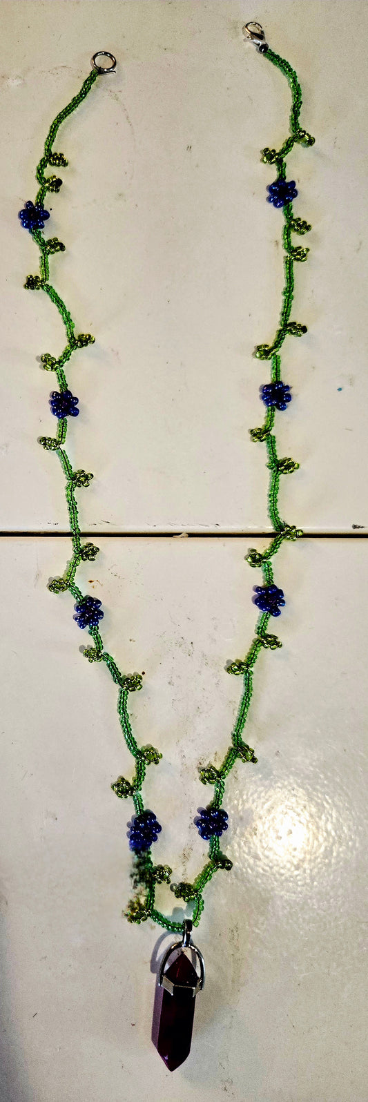 Leaf style daisy chain with crystal pendant