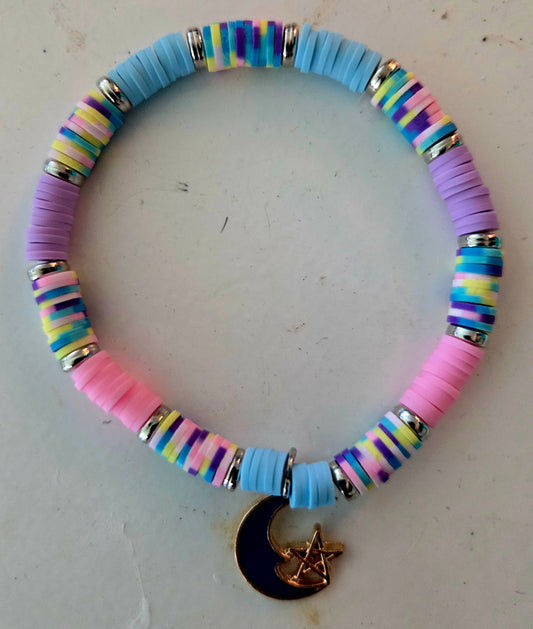 Multi colored beaded bracelet with blue moon pendant