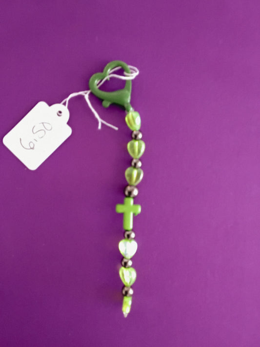 Green and white cross keychain