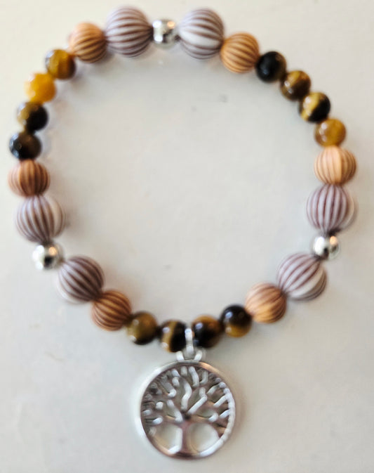 Tiger's eye and painted wooden bead bracelet featuring a life tree pendant