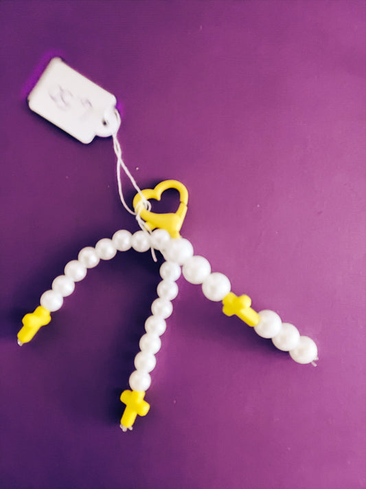 Yellow and white cross keychain