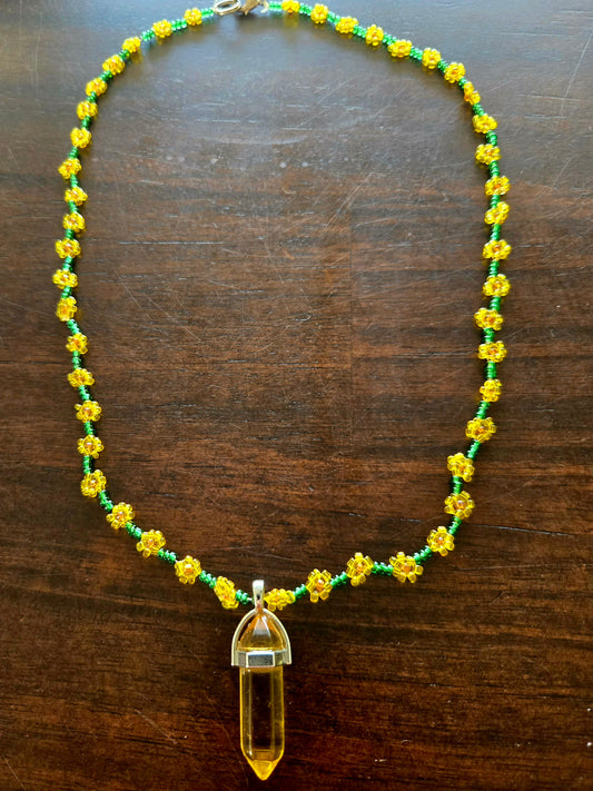 Sunflower colored rope style daisy chain with crystal pendant