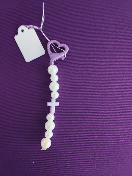 Purple and white cross keychain