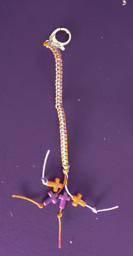 Light purple and orange macrame cross keychain