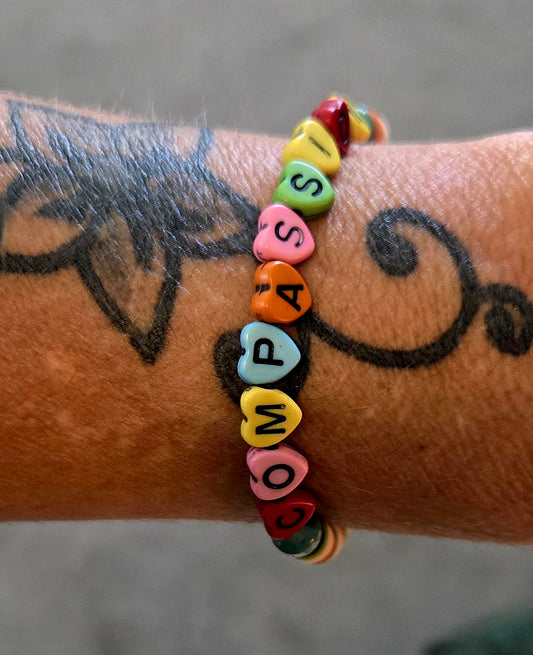 COMPASSION word beaded bracelet