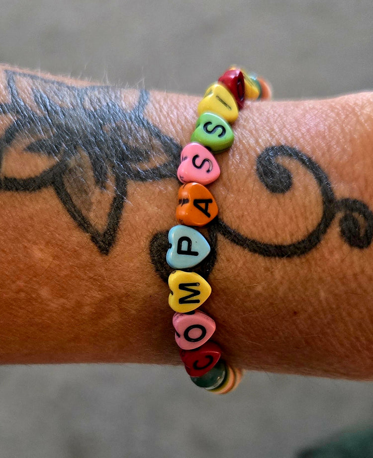 COMPASSION word beaded bracelet