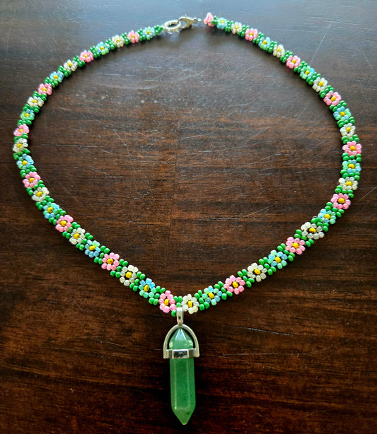 Daisy chain with crystal pendant