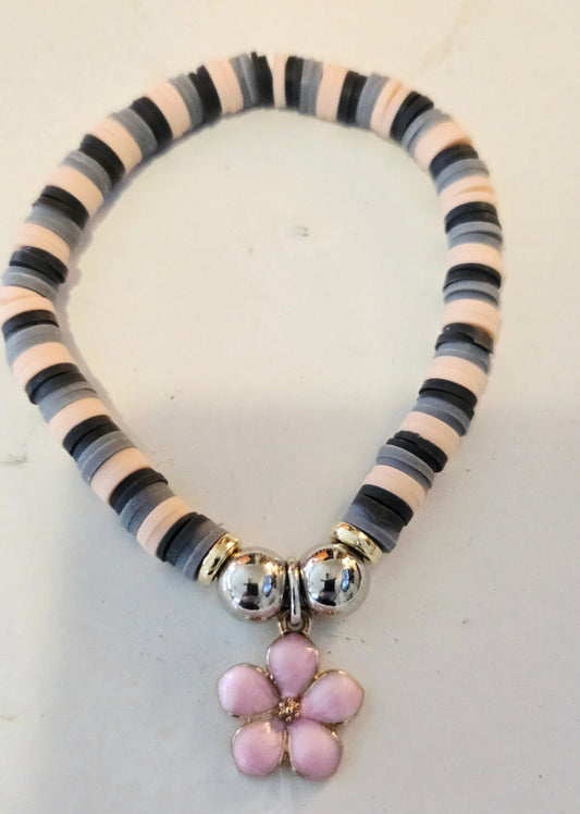 Pink and Grey multi colored bracelet with pink daisy charm