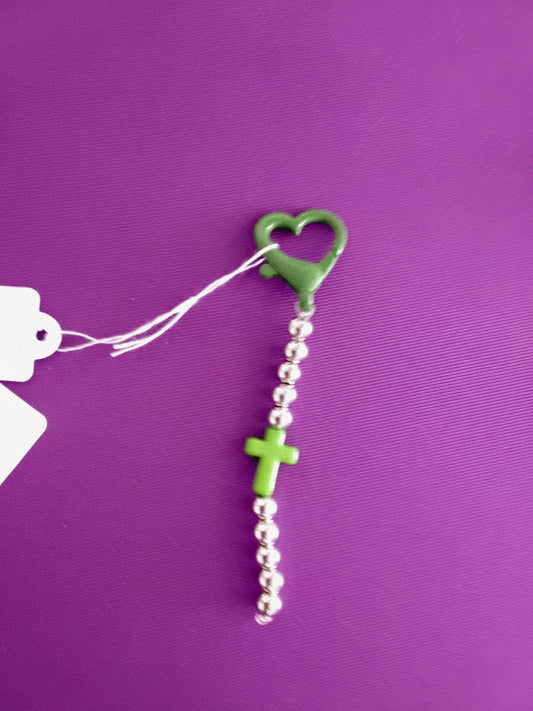Green and silver cross keychain