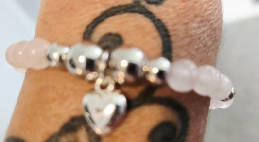 Rose quartz and silver beaded bracelet with heart charm
